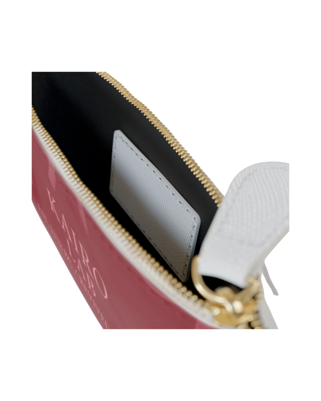 Nahaufnahme einer roten Clutch mit goldfarbenem Reißverschluss und weißem Innenfach